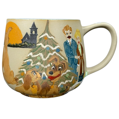 Lady and the Tramp hand-painted pottery mug featuring a festive scene with dogs and a Christmas tree