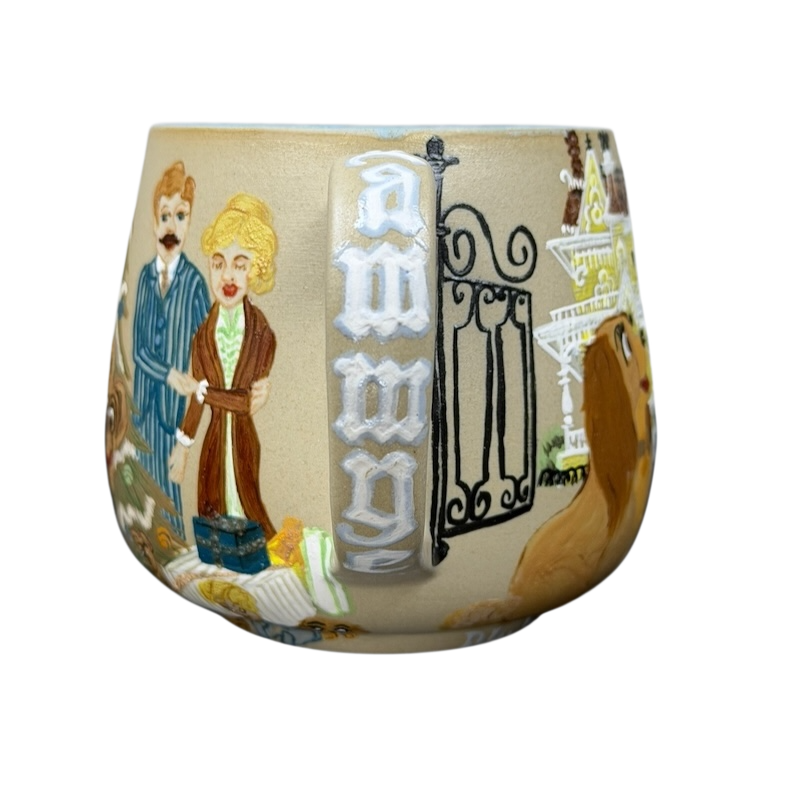 Lady and the Tramp hand-painted pottery mug featuring charming character illustrations