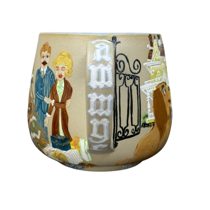 Lady and the Tramp hand-painted pottery mug featuring charming character illustrations