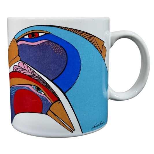 Laurel Burch vintage birds mug with colorful artistic bird design on a white ceramic mug