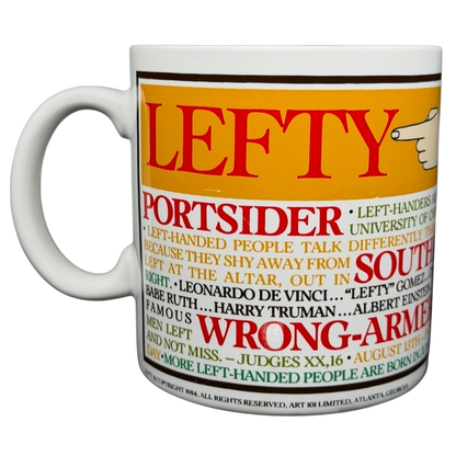 Lefty Kenneth Grooms Mug The Toscany Collection featuring colorful graphics and text about left-handedness