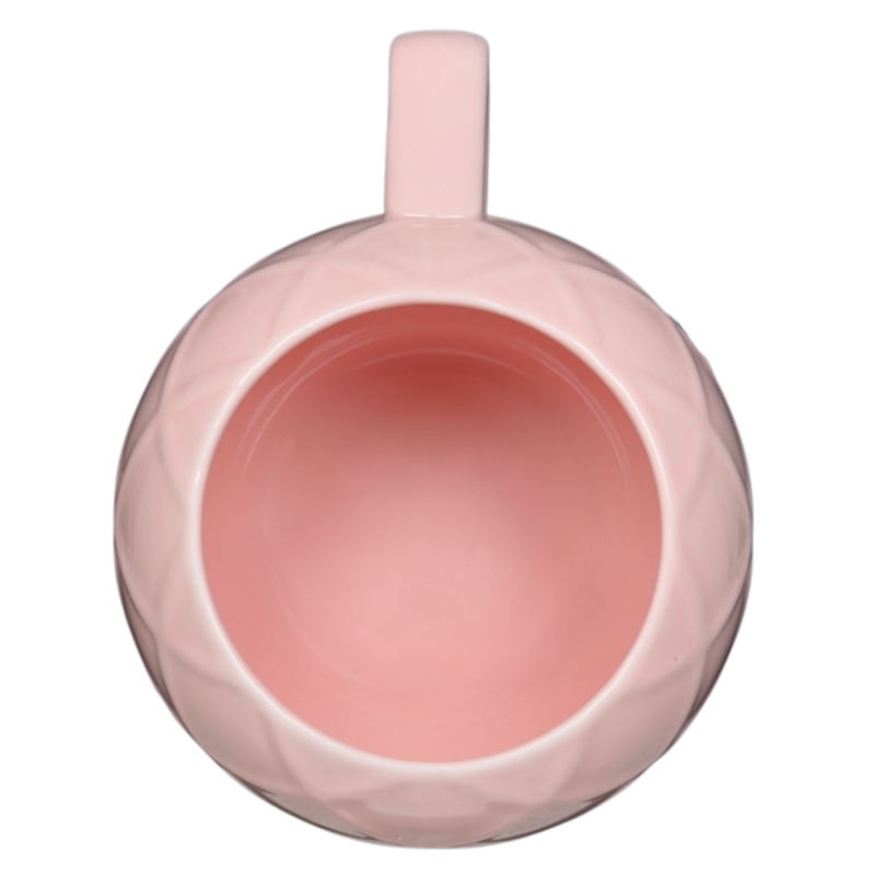 Leonard's Bakery collectible mug in pink with a textured design and a round shape