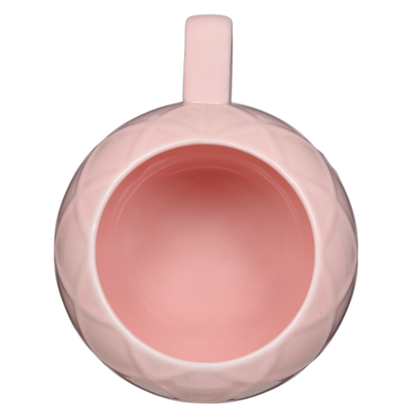 Leonard's Bakery collectible mug in pink with a textured design and a round shape