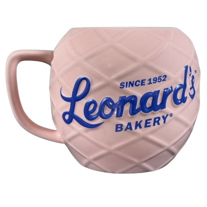 Leonard's Bakery collectible mug in pink with textured design and blue logo since 1952
