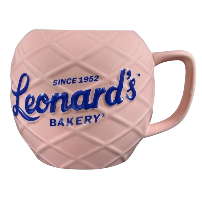 Leonard's Bakery collectible mug in pink with a textured design and blue lettering since 1952