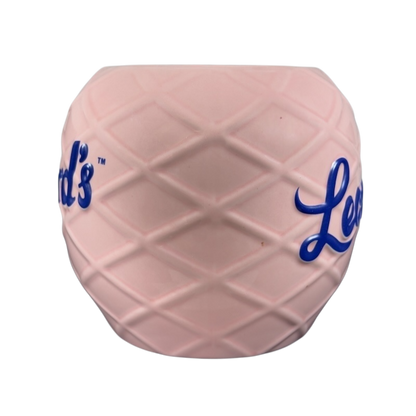 Leonard's Bakery collectible mug in pink with a diamond pattern and blue lettering