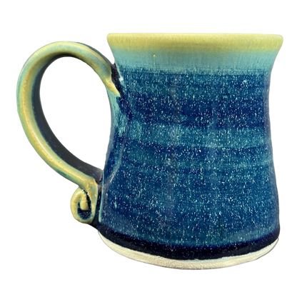 Green blue signed Lindsoe Clayworks mug with a unique glaze and elegant handle design