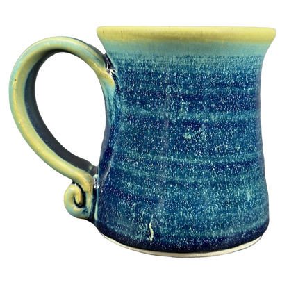 Green blue signed Lindsoe Clayworks mug with a unique swirl handle and textured finish