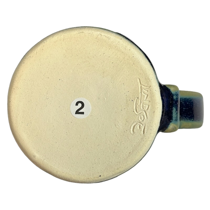 Green blue signed Lindsoe Clayworks mug with a smooth bottom and numbered detail