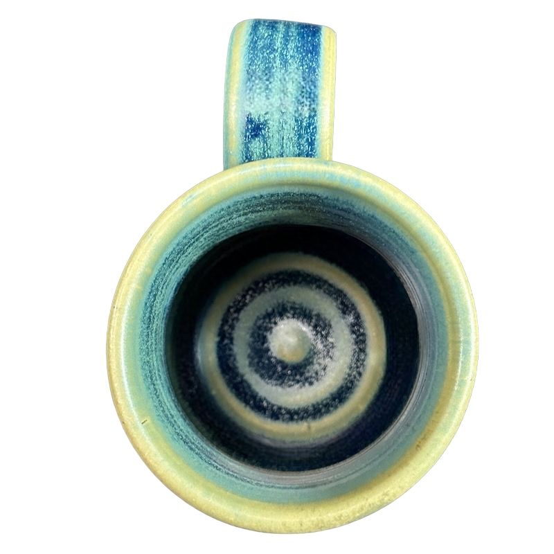 Green blue signed Lindsoe Clayworks mug showcasing a spiral design from above