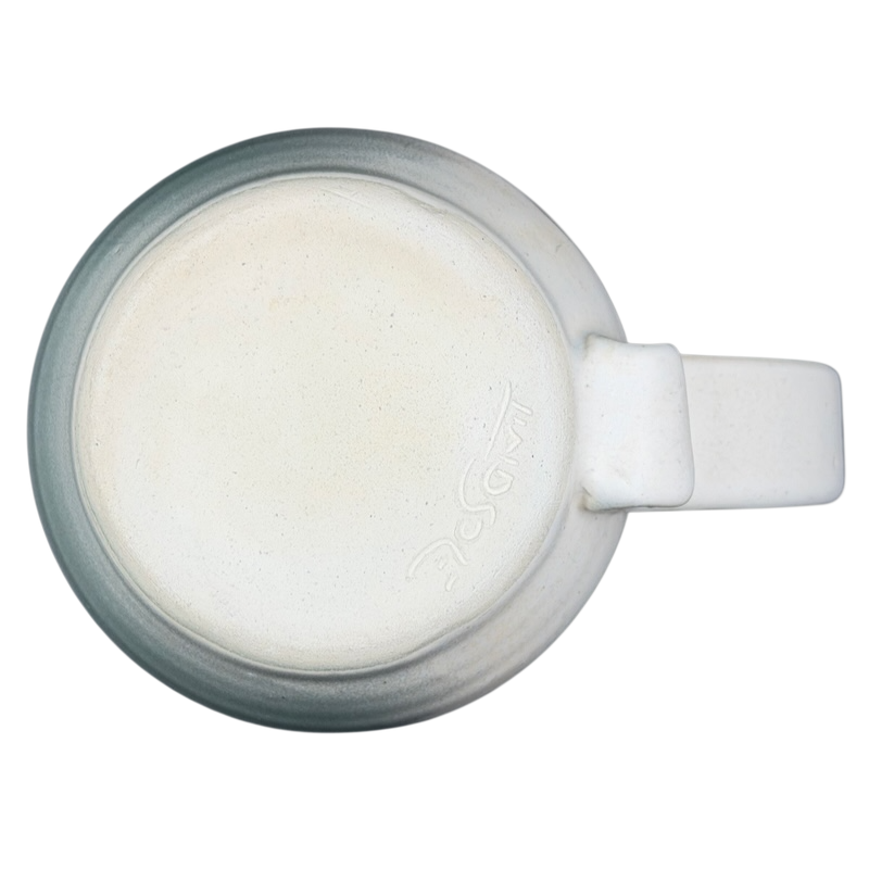 Bottom view of a Lindsoe Clayworks trees collectible mug showcasing its smooth glaze and craftsmanship