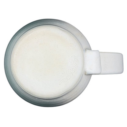 Bottom view of a Lindsoe Clayworks trees collectible mug showcasing its smooth glaze and craftsmanship