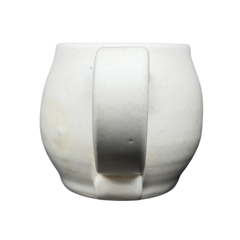 Lindsoe Clayworks trees collectible mug with a unique curved handle and textured surface