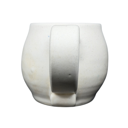 Lindsoe Clayworks trees collectible mug with a unique curved handle and textured surface