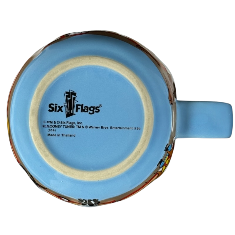 Bottom view of Looney Tunes 3D embossed Six Flags mug showing brand logo and details