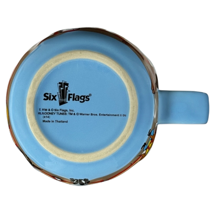 Bottom view of Looney Tunes 3D embossed Six Flags mug showing brand logo and details