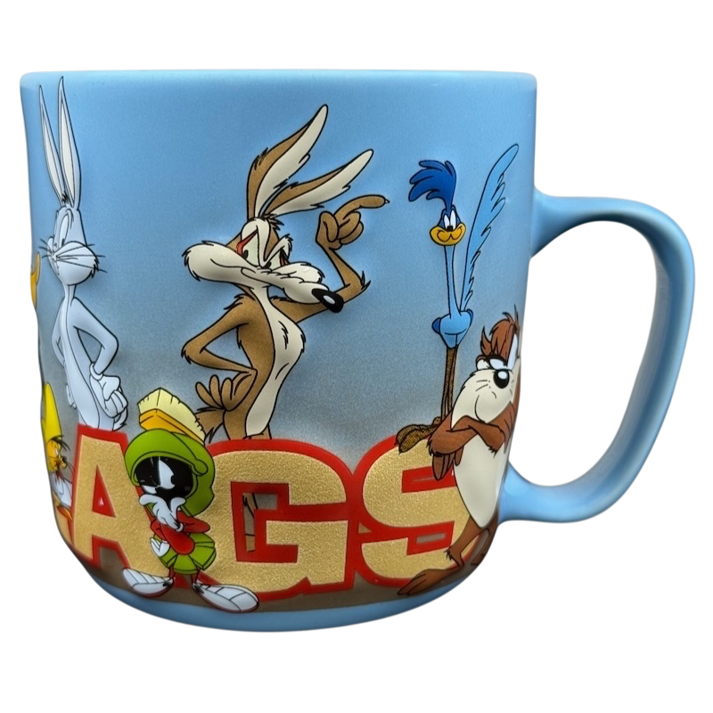 Looney Tunes 3D embossed Six Flags mug featuring Bugs Bunny, Daffy Duck, and other characters