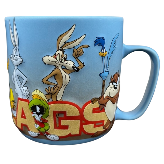 Looney Tunes 3D embossed Six Flags mug featuring Bugs Bunny, Daffy Duck, and other characters