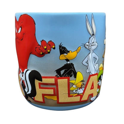 Looney Tunes 3D embossed Six Flags mug featuring iconic characters like Bugs Bunny and Daffy Duck