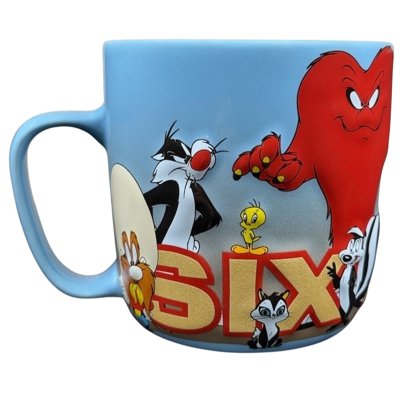 Looney Tunes 3D embossed Six Flags mug featuring beloved cartoon characters in vibrant colors