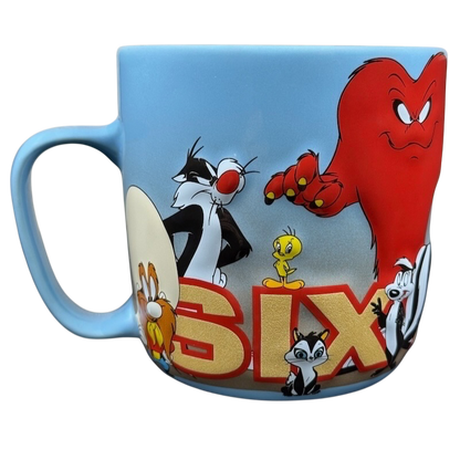 Looney Tunes 3D embossed Six Flags mug featuring beloved cartoon characters in vibrant colors