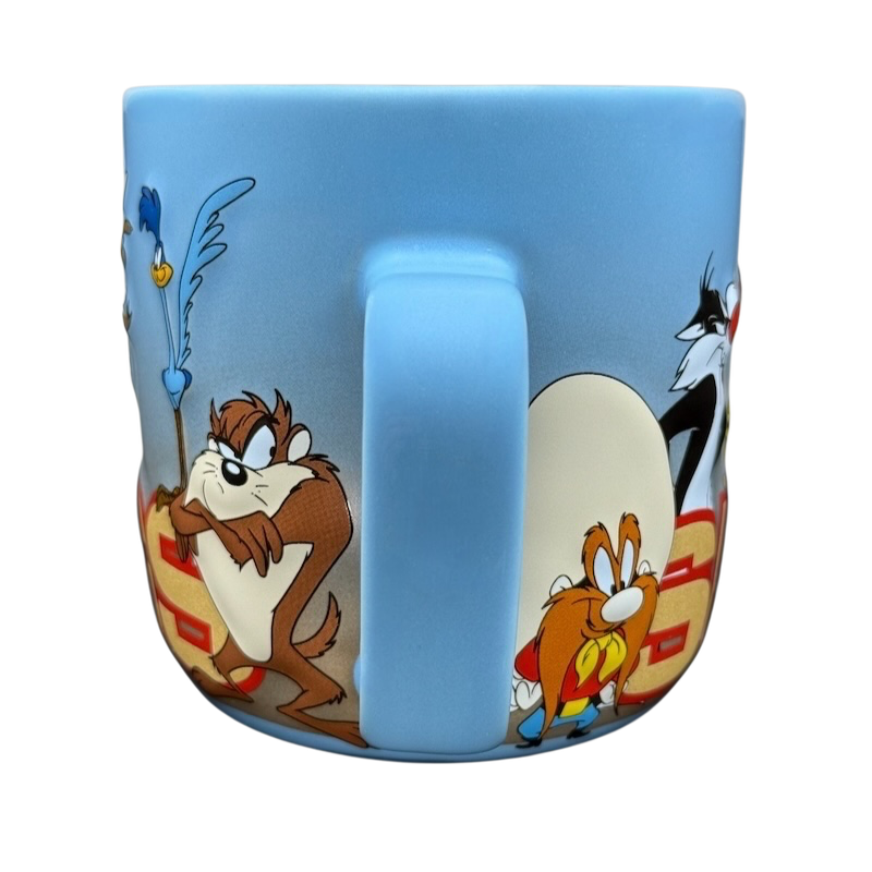 Looney Tunes 3D embossed Six Flags mug featuring iconic characters in vibrant colors