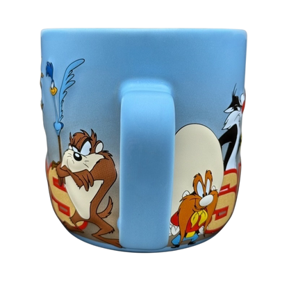 Looney Tunes 3D embossed Six Flags mug featuring iconic characters in vibrant colors