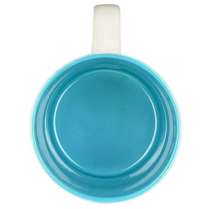 Top view of the LORI Poetry Name Mug Papel in vibrant turquoise interior and white outer surface