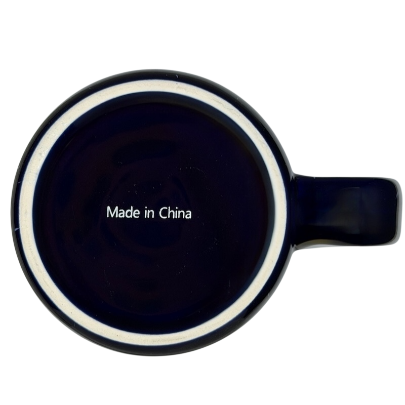 Bottom view of a glossy black Louder With Crowder Mug with clean white rim and text