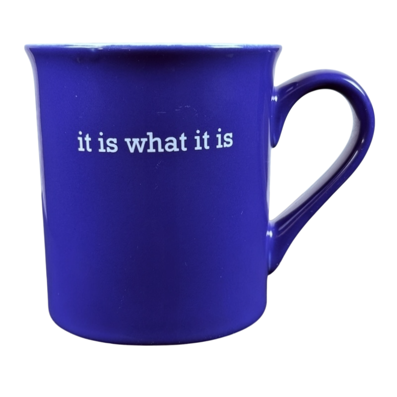 Blue ceramic coffee mug with white text it is what it is Love Your Mug. Shown with right handle