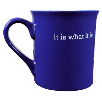 Dark blue ceramic coffee mug with white it is what it is Love Your Mug printed text and curved handle