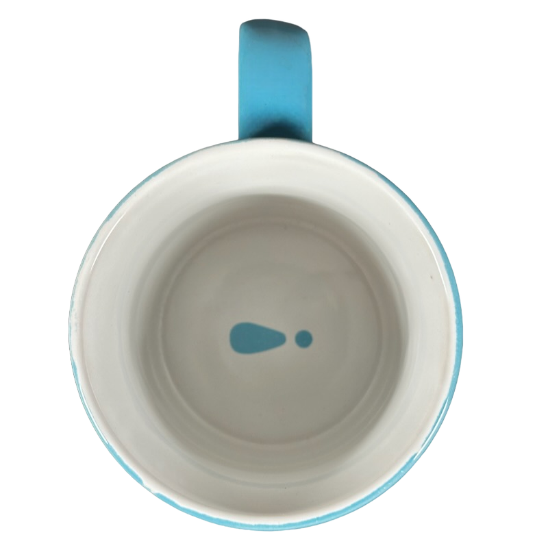 Top view of ceramic mug with white interior and blue teardrop design and blue handle make it happen blue Love Your Mug