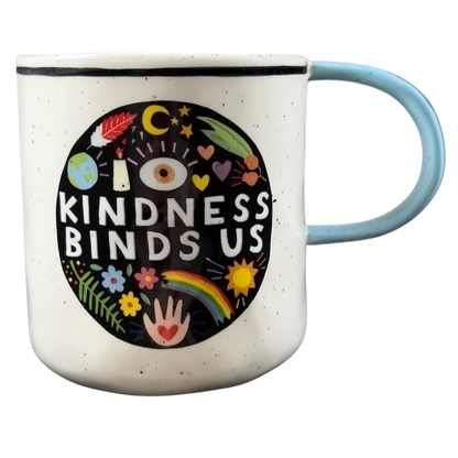 Luke John Matthew Arnold Anthropologie Kindness mug with colorful design and blue handle