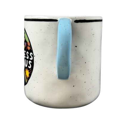 Luke John Matthew Arnold Anthropologie Kindness mug with blue handle and colorful design