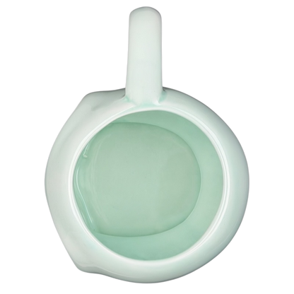 Lyon Motion Products vintage alien mug with a smooth mint green interior and classic design