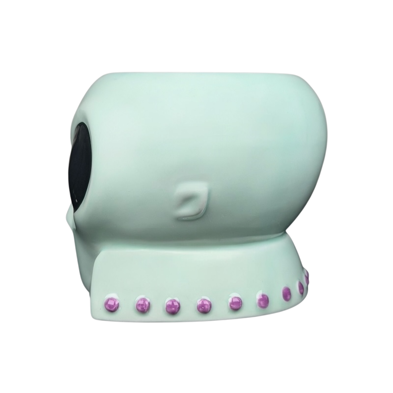 Lyon Motion Products vintage alien mug in green with pink detailing on the back side