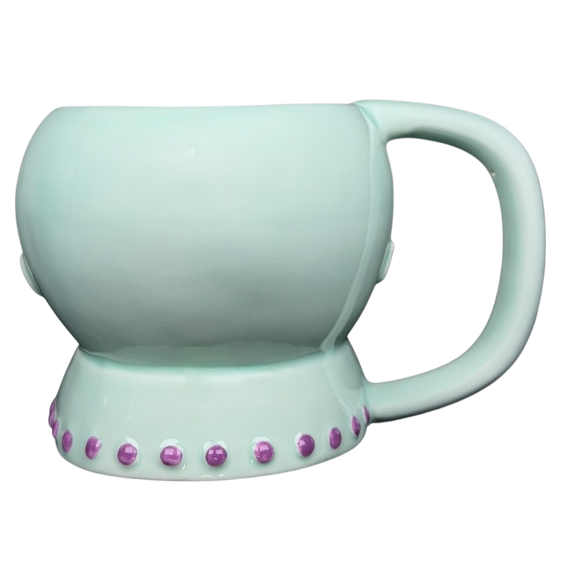 Lyon Motion Products vintage alien mug with a unique design and playful color scheme