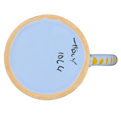 Bottom view of a Floral Hand-Painted Made in Italy Pottery Mug showcasing artisan craftsmanship