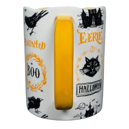Magenta Angela Staehling Halloween collectible mug white ceramic with yellow handle and black orange spooky illustrations