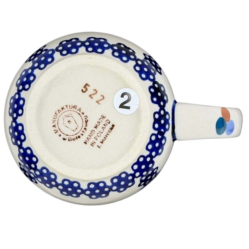 Underneath view of a Polish Pottery Boleslawiec Blue Geometric Circles Mug Manufaktura with a decorative handle