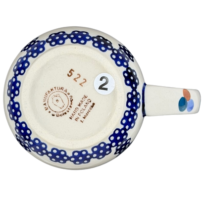 Underneath view of a Polish Pottery Boleslawiec Blue Geometric Circles Mug Manufaktura with a decorative handle