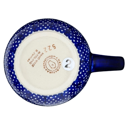 Bottom view of Polish Pottery Boleslawiec Blue Polka Dot & Orange Tulip Mug Manufaktura with signature pattern