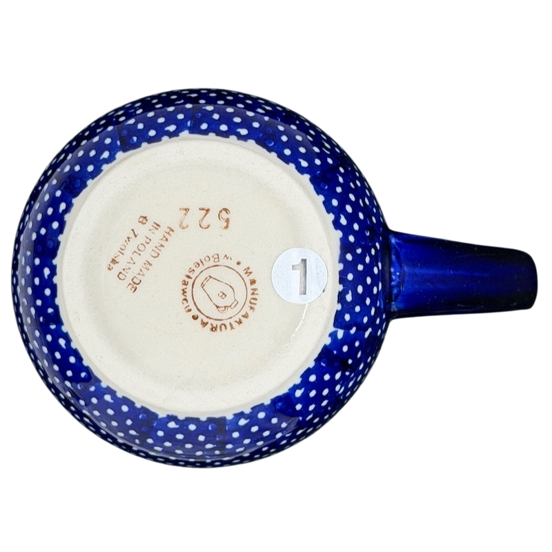 Bottom view of the Polish Pottery Boleslawiec Blue Polka Dot & Orange Tulip Mug Manufaktura showcasing its unique design
