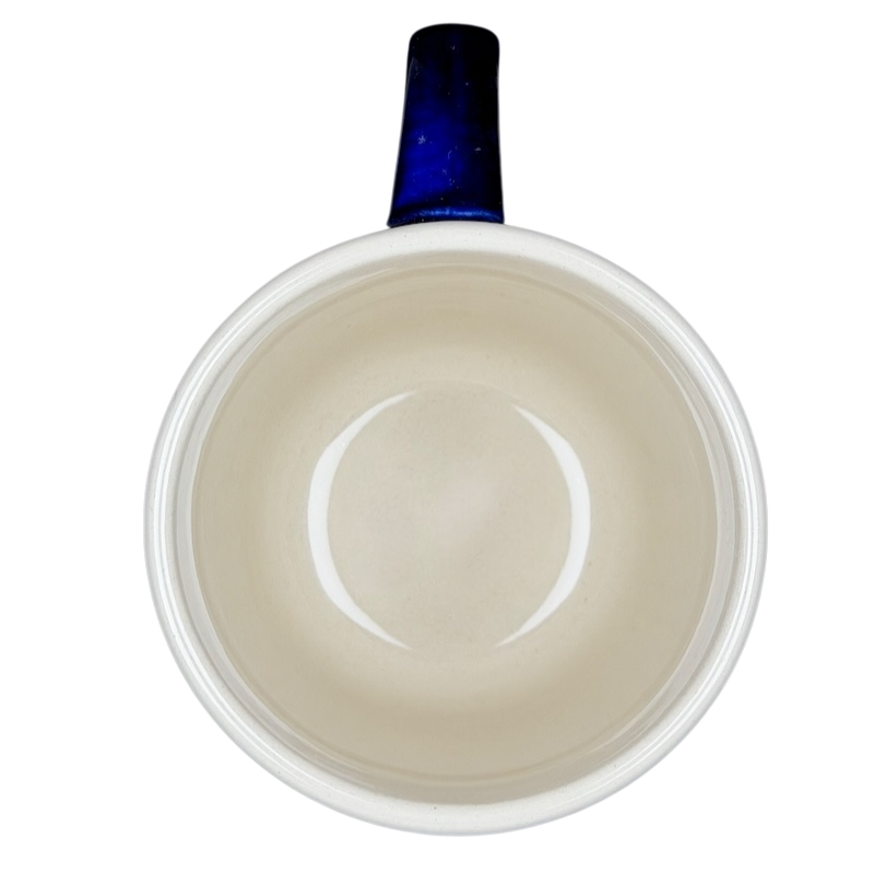 Inside view of Polish Pottery Boleslawiec Blue Polka Dot & Orange Tulip Mug Manufaktura showcasing its smooth finish