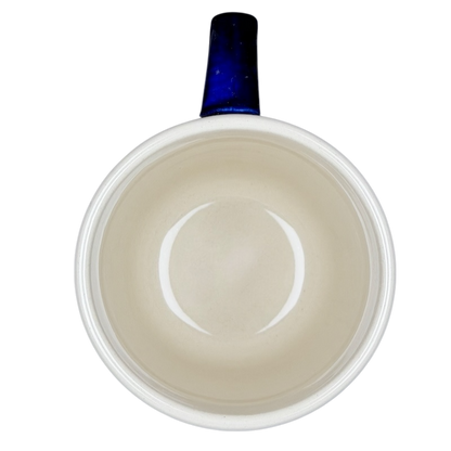 Inside view of Polish Pottery Boleslawiec Blue Polka Dot & Orange Tulip Mug Manufaktura showcasing its smooth finish