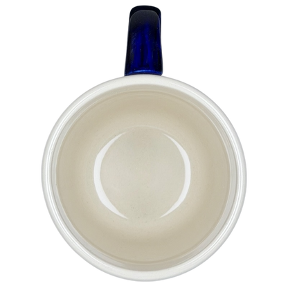 Inside view of Polish Pottery Boleslawiec Blue Polka Dot & Orange Tulip Mug Manufaktura showcasing its smooth ceramic finish