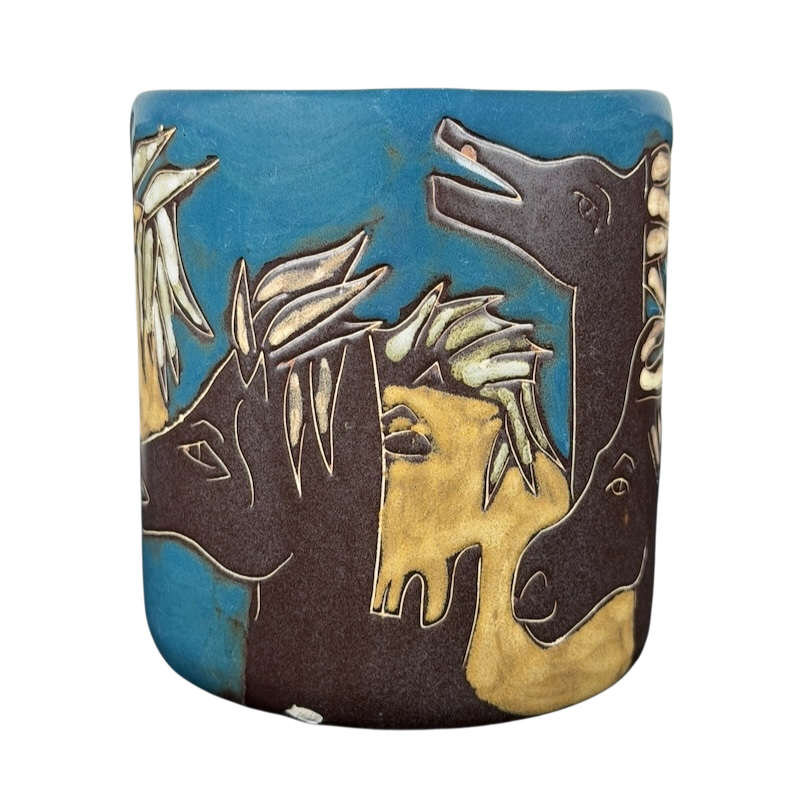 Mara Mexico pottery mug horse with vibrant colors and intricate horse designs on a blue background
