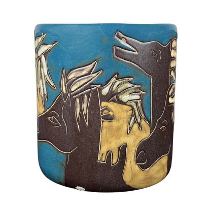 Mara Mexico pottery mug horse with vibrant colors and intricate horse designs on a blue background