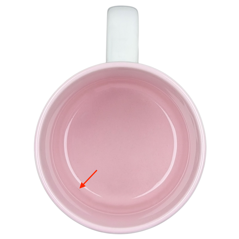 Top view of a pink Marilyn poetry mug vintage showcasing its smooth interior design