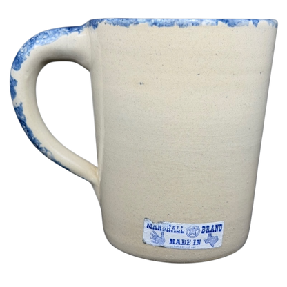 Texas Bluebonnet Pottery Mug Marshall Brand with a rustic design and blue rim for a charming kitchen accessory